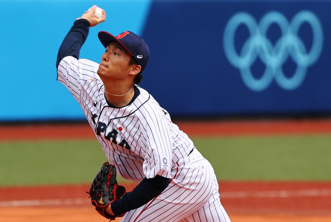Tokyo 2020 Olympics - Baseball - Men - Opening Round - Group A - Dominican Republic v Japan - Fukushima Azuma Baseball Stadium, Fukushima, Japan – July 28, 2021. Yoshinobu Yamamoto of Japan in action. REUTERS/Jorge Silva