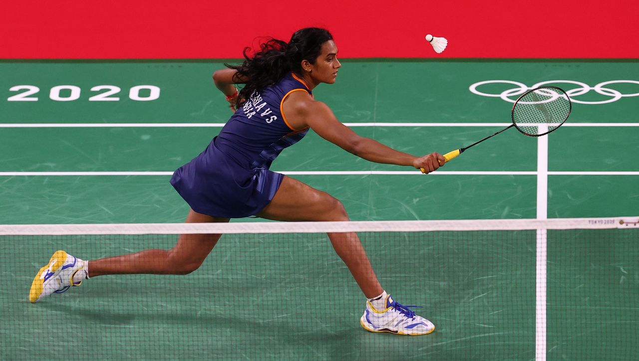 FILE PHOTO: Tokyo 2020 Olympics - Badminton - Women's Singles - Group Stage - MFS - Musashino Forest Sport Plaza, Tokyo, Japan – July 25, 2021. P.V. Sindhu of India in action during the match against Ksenia Polikarpova of Israel. REUTERS/Leonhard Foeger/File Photo
