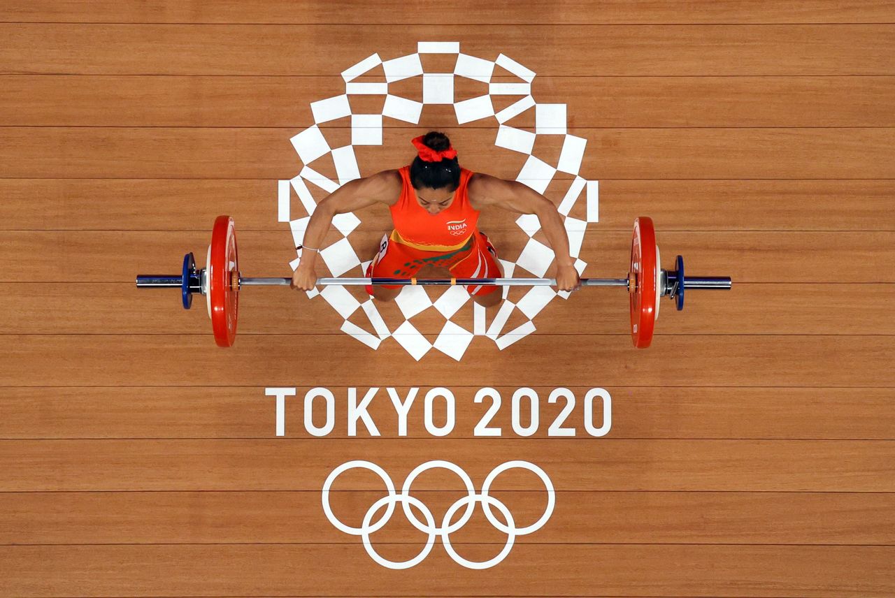 Tokyo 2020 Olympics - Weightlifting - Women's 49kg - Group A - Tokyo International Forum, Tokyo, Japan - July 24, 2021. Mirabai Chanu Saikhom of India in action. Pool via REUTERS/Chris Graythen