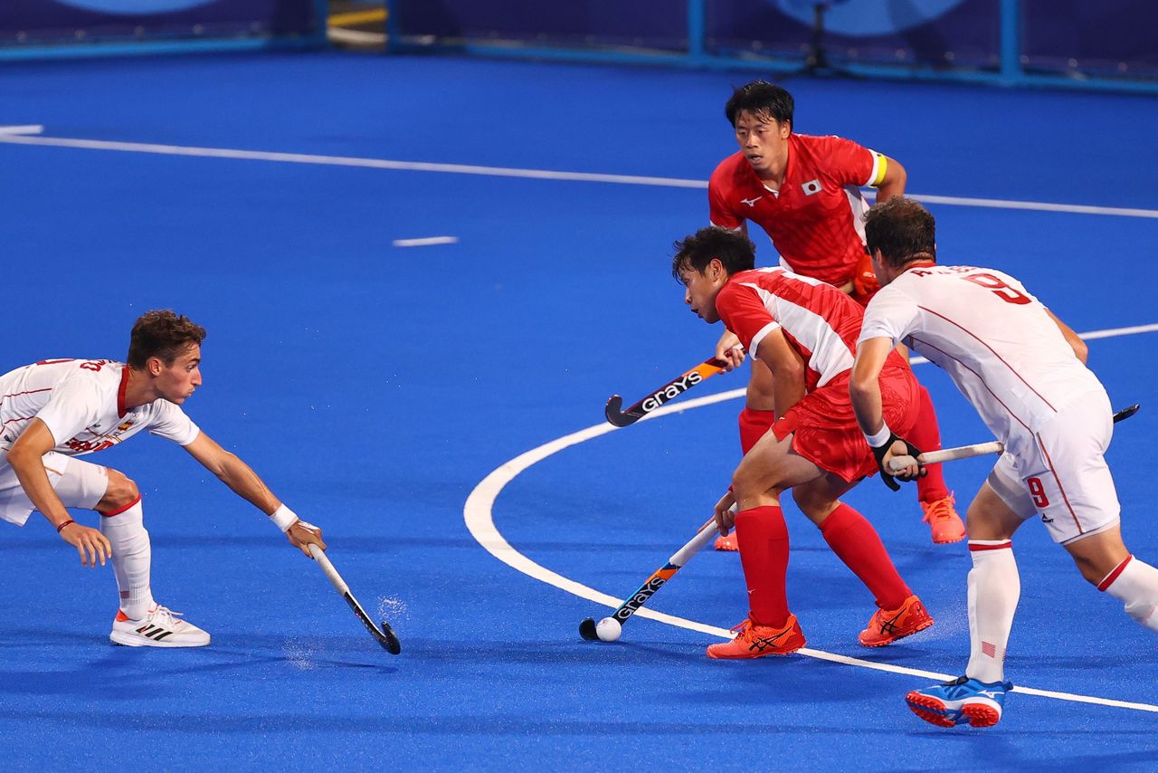 Tokyo 2020 Olympics - Hockey - Men's Pool A - Japan v Spain - Oi Hockey Stadium, Tokyo, Japan - July 28, 2021. Marc Bolto of Spain in action against Masaki Ohashi of Japan. REUTERS/Corinna Kern
