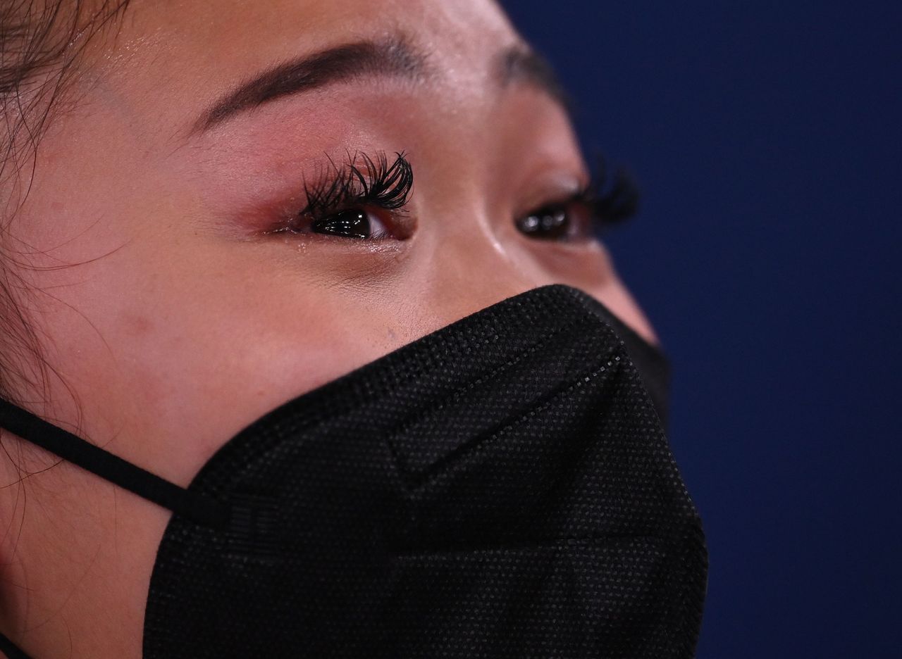 Tokyo 2020 Olympics - Gymnastics - Artistic - Women's Individual All-Around - Final - Ariake Gymnastics Centre, Tokyo, Japan - July 29, 2021. Sunisa Lee of the United States wearing a protective face mask reacts REUTERS/Dylan Martinez