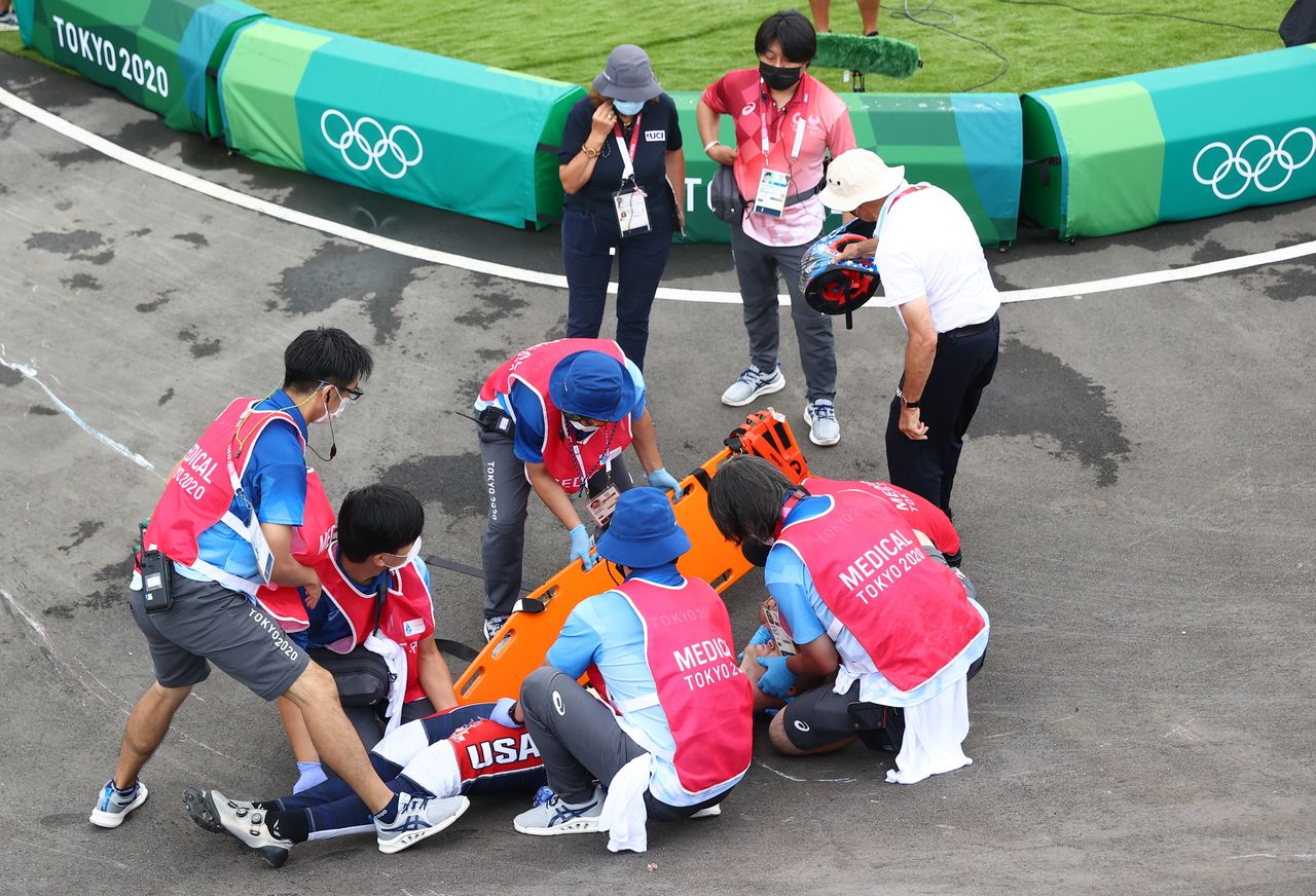 Tokyo 2020 Olympics - BMX Racing - Men's Individual - Semifinal - AUP - Ariake Urban Sports Park, Tokyo, Japan - July 30, 2021. Connor Fields of the United States receives medical attention. REUTERS/Matthew Childs