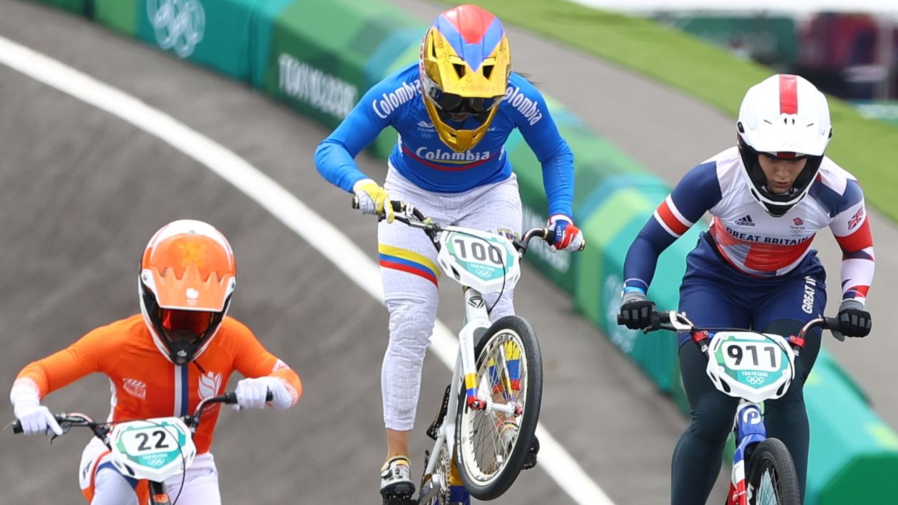 Tokyo 2020 Olympics - BMX Racing - Women's Individual - Final - AUP - Ariake Urban Sports Park, Tokyo, Japan - July 30, 2021. Bethany Shriever of Britain, Merel Smulders of the Netherlands and Mariana Pajon of Colombia in action. REUTERS/Matthew Childs