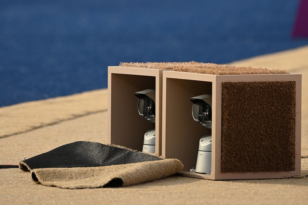 Cameras positioned 12 metres before the archery shooting line that live track the heart beats per minute of over 100 consenting archers are seen at the Yumenoshima Archery Field, during the Tokyo 2020 Olympic Games, Japan, July 29, 2021. Picture taken July 29, 2021. REUTERS/Clodagh Kilcoyne