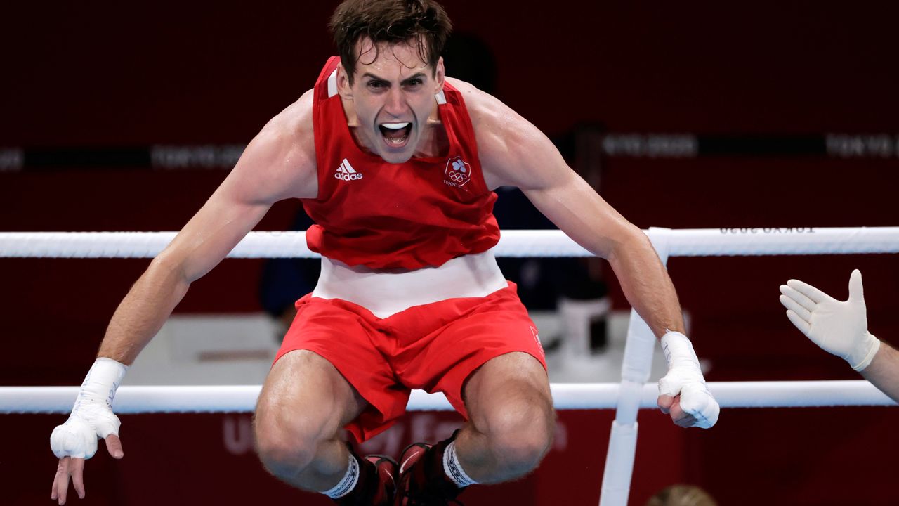 Tokyo 2020 Olympics - Boxing - Men's Welterweight - Quarterfinal - Kokugikan Arena - Tokyo, Japan - July 30, 2021. Aidan Walsh of Ireland reacts after winning his fight against Merven Clair of Mauritius. REUTERS/Ueslei Marcelino