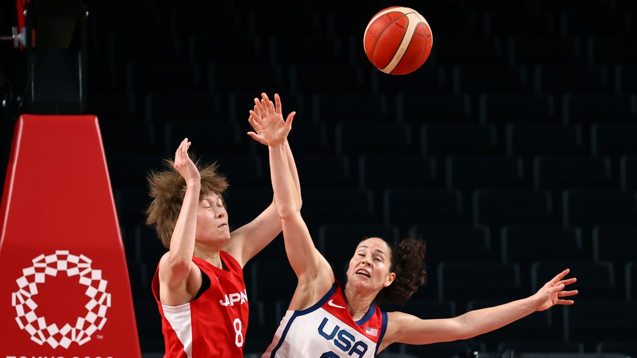 Tokyo 2020 Olympics - Basketball - Women - Group B - United States v Japan - Saitama Super Arena, Saitama, Japan - July 30, 2021. Sue Bird of the United States in action with Maki Takada of Japan REUTERS/Brian Snyder