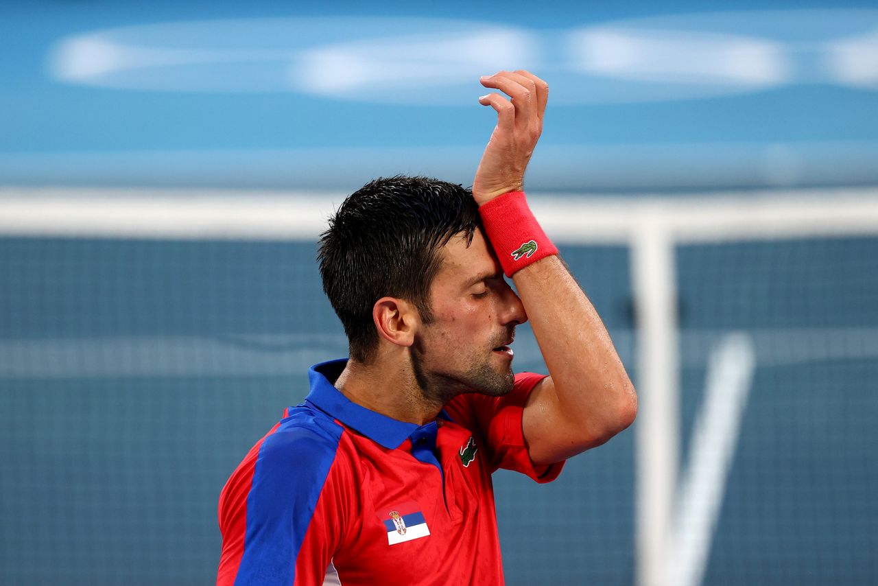 Tokyo 2020 Olympics - Tennis - Men's Singles - Semifinal - Ariake Tennis Park - Tokyo, Japan - July 30, 2021. Novak Djokovic of Serbia reacts during his semifinal match against Alexander Zverev of Germany REUTERS/Mike Segar