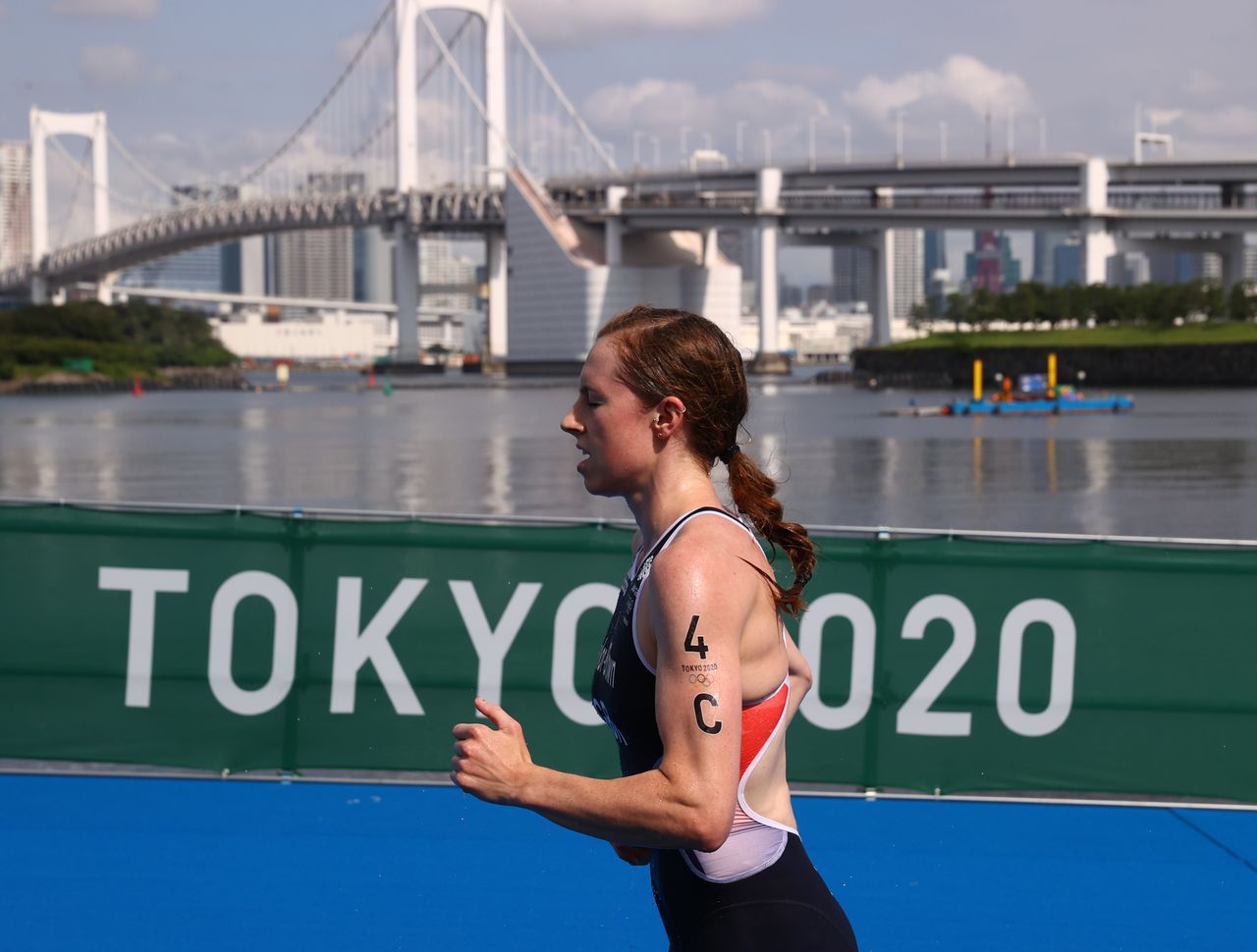 Tokyo 2020 Olympics - Triathlon - Mixed Team Relay - Final - Odaiba Marine Park, Tokyo, Japan - July 31, 2021. Georgia Taylor-Brown of Britain in action REUTERS/Kacper Pempel