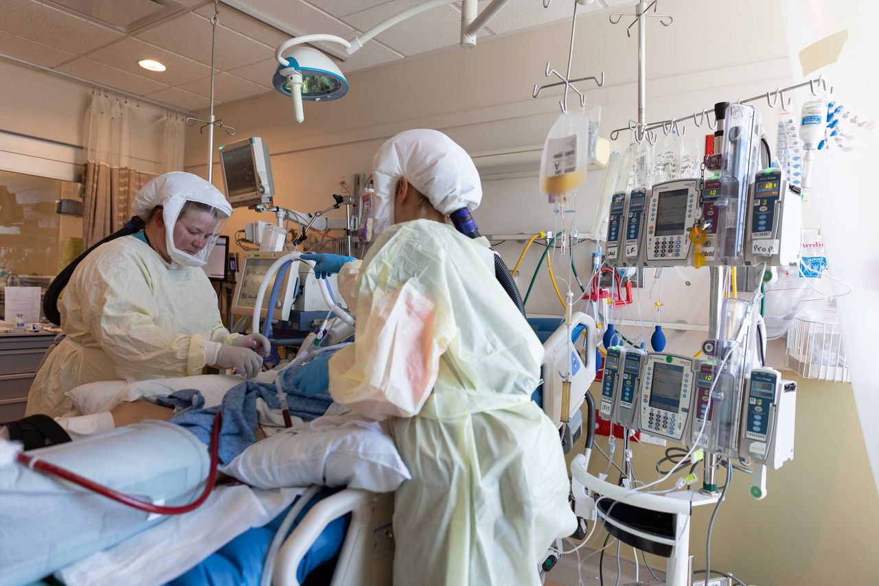 Healthcare personnel work in a coronavirus disease (COVID-19) intensive care unit where they are dealing with a surge in cases of the Delta variant at Intermountain Medical Center in Murray, Utah, U.S., in this handout photo provided July 23, 2021. Courtesy of Intermountain Health/Handout via REUTERS THIS IMAGE HAS BEEN SUPPLIED BY A THIRD PARTY. NO RESALES. NO ARCHIVES. MANDATORY CREDIT