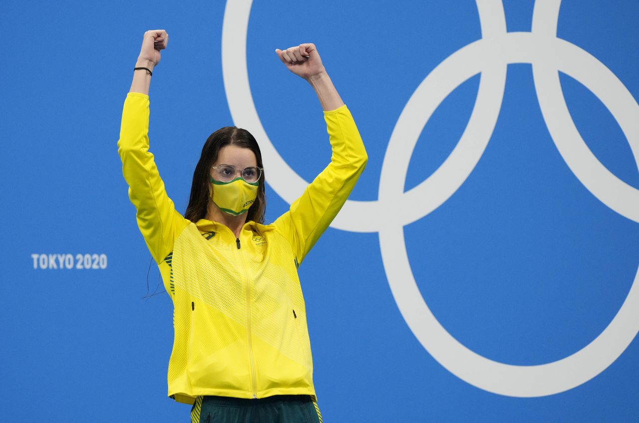 Jul 31, 2021; Tokyo, Japan; Kaylee McKeown (AUS) celebrates her gold medal during the medals ceremony for the women