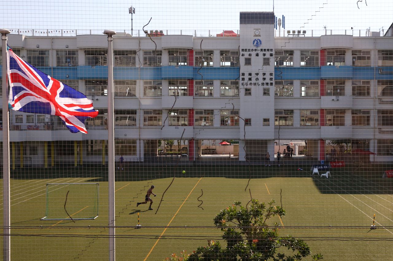 FILE PHOTO: Tokyo 2020 Olympics Preview - Tokyo, Japan - July 22, 2021 General view of the Great Britain flag and Team GB signs at a training centre REUTERS/Thomas Peter