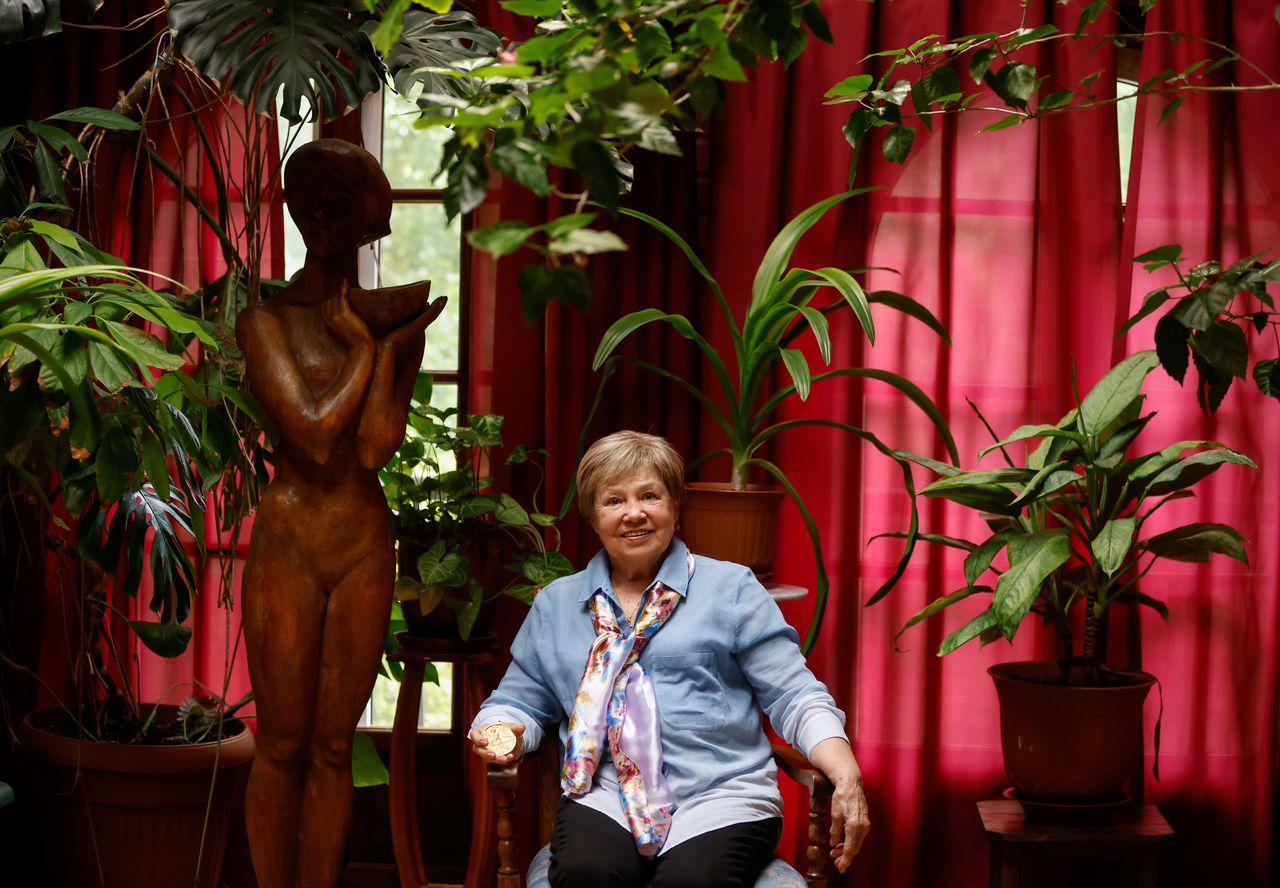 Legendary Soviet gymnast Larisa Latynina, who holds the record for the most Olympic gold medals won by a gymnast, poses in her home in village Kalyanino, Moscow region, Russia July 30, 2021. REUTERS/Evgenia Novozhenina