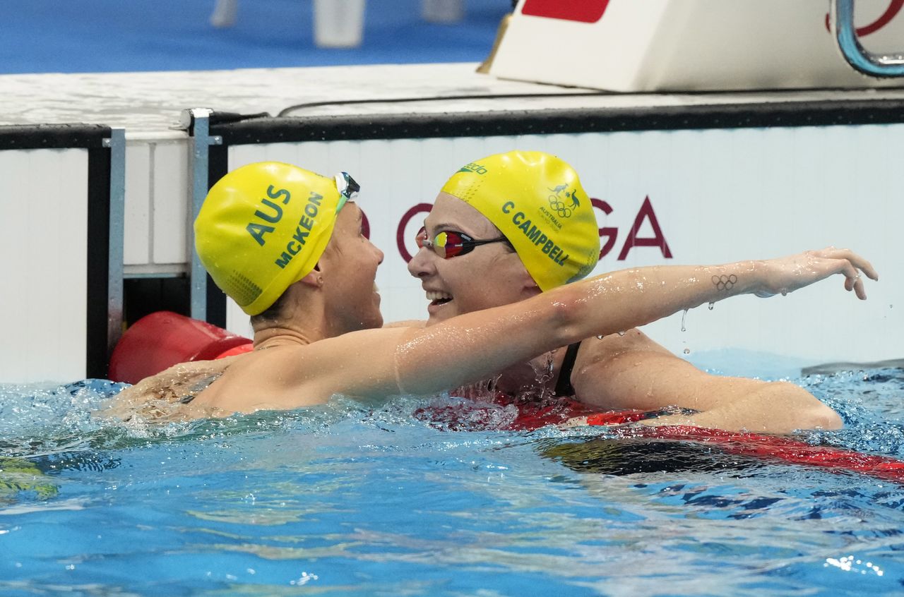 Aug 1, 2021; Tokyo, Japan; Emma McKeon (AUS) celebrates with Cate Campbell (AUS) after winning the women