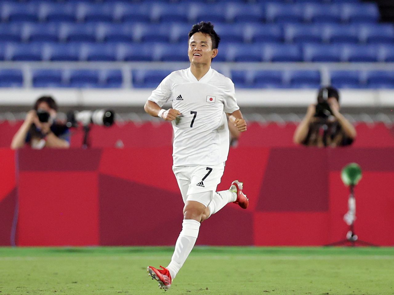 FILE PHOTO: Takefusa Kubo of Japan celebrates scoring their first goal against France at the Tokyo 2020 Olympics. REUTERS/Hannah Mckay/File Photo