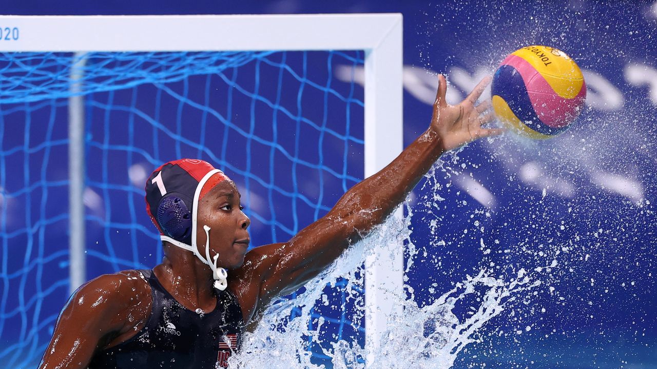 Tokyo 2020 Olympics - Water Polo - Women - Quarterfinal - Canada v United States - Tatsumi Water Polo Centre, Tokyo, Japan - August 3, 2021. Ashleigh Johnson of the United States saves the ball. REUTERS/Gonzalo Fuentes