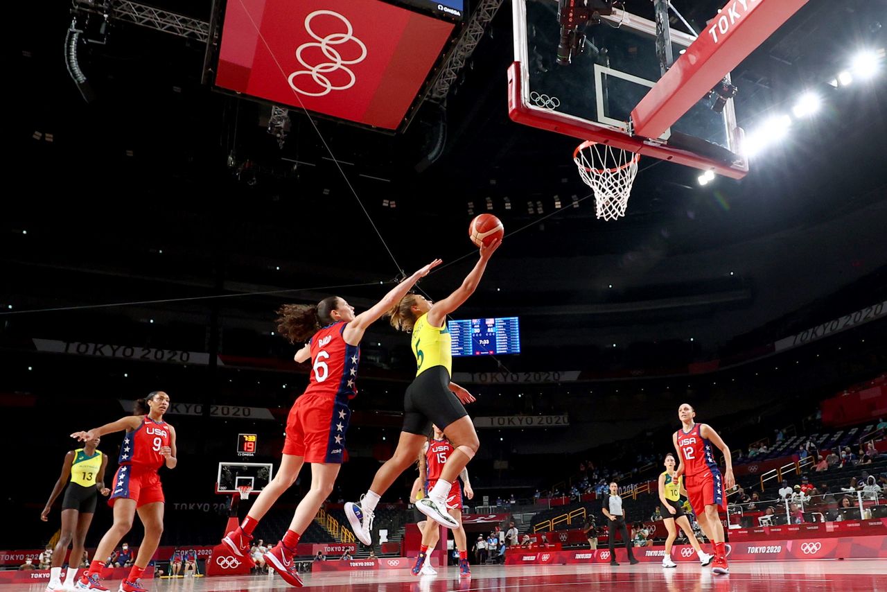 Tokyo 2020 Olympics - Basketball - Women - Quarterfinal - Australia v United States - Saitama Super Arena, Saitama, Japan - August 4, 2021. Leilani Mitchell of Australia scores a basket REUTERS/Brian Snyder
