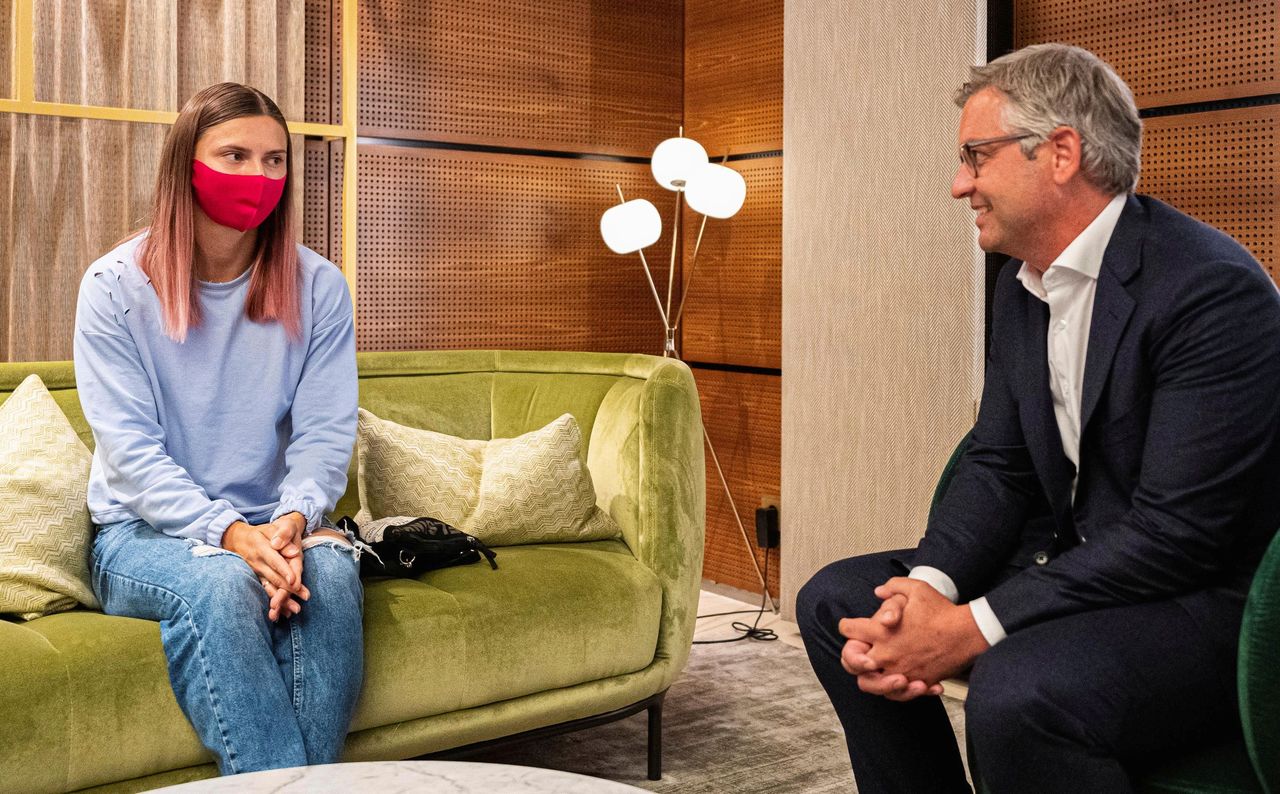 Belarusian Sprinter Krystsina Tsimanouskaya meets Austrian State Secretary Magnus Brunner during a stop at Schwechat airport in Vienna, Austria, August 4, 2021. Federal Chancellory of Austria/Florian Schroetter/Handout via REUTERS