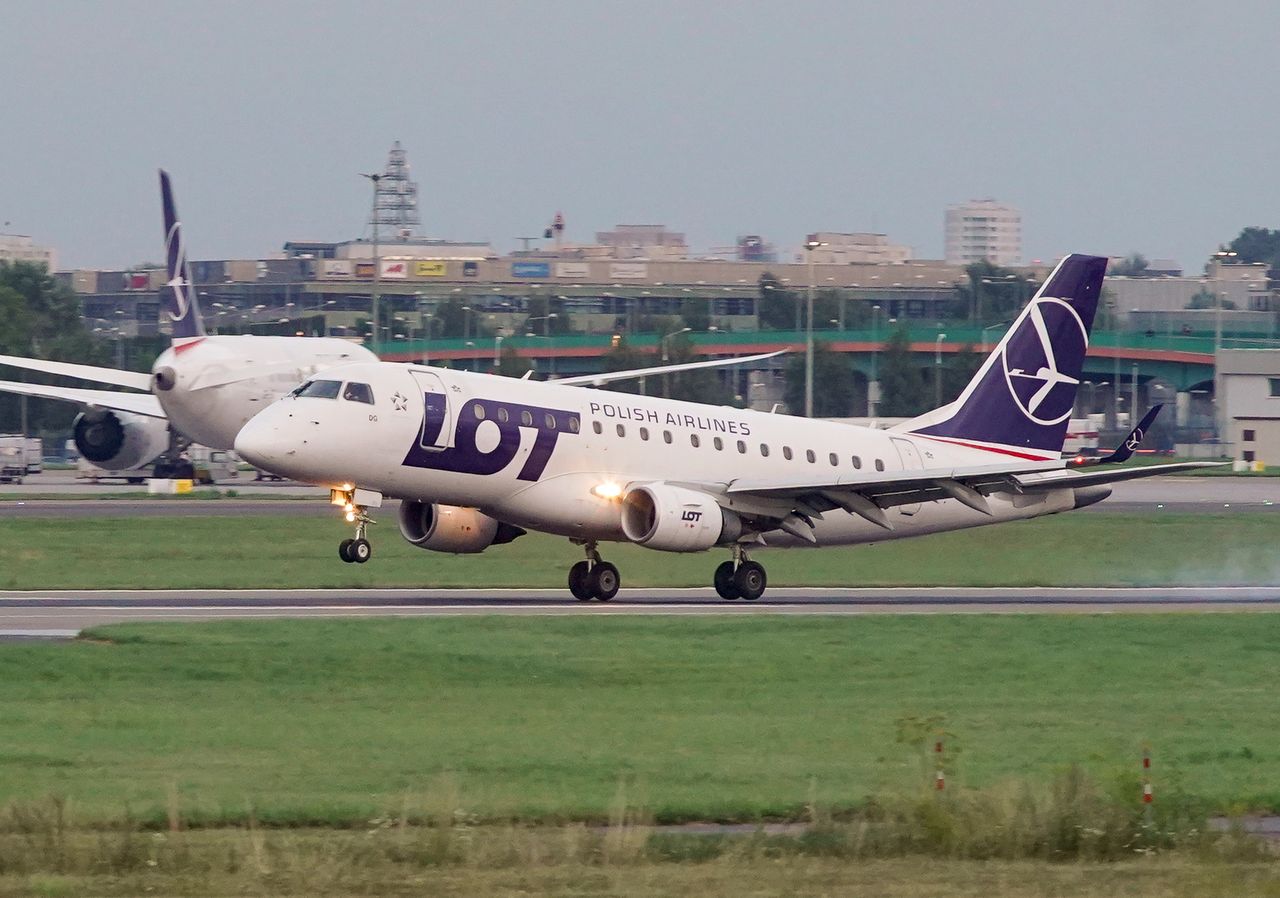 A LOT Polish Airlines plane carrying Belarusian sprinter Krystsina Tsimanouskaya, who left the Olympic Games in Tokyo and seeks asylum in Poland, is seen on tarmac on arrival to Warsaw, Poland August 4, 2021. REUTERS/Darek Golik