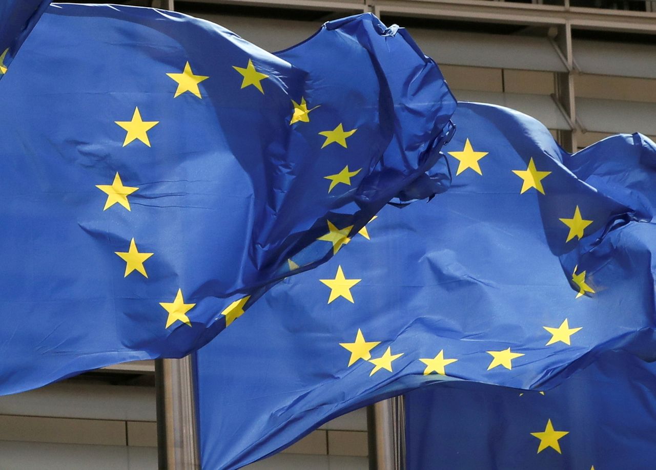 FILE PHOTO: European Union flags flutter outside the EU Commission headquarters in Brussels, Belgium May 5, 2021. REUTERS/Yves Herman/File Photo
