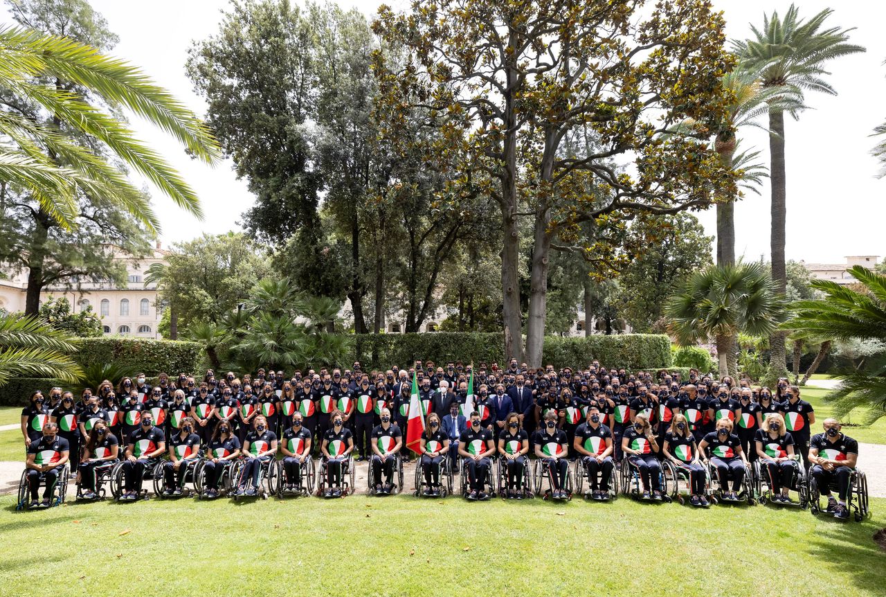 FILE PHOTO: Italian President Sergio Mattarella poses for a photo with Italian athletes departing to the Tokyo 2020 Olympic and Paralympic Games, in Rome, Italy June 23, 2021. Paolo Giandotti/Presidential Press Office/Handout via REUTERS