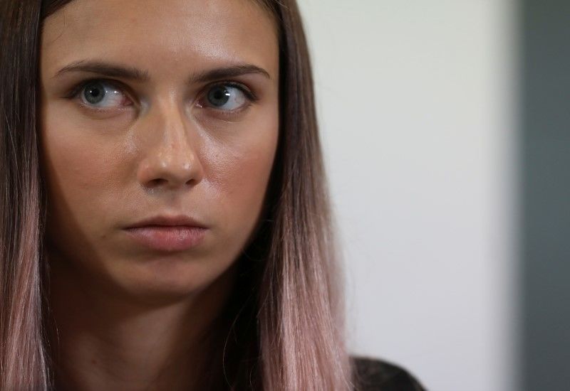 FILE PHOTO: Belarusian sprinter Krystsina Tsimanouskaya, who left the Olympic Games in Tokyo and seeks asylum in Poland, attends a news conference in Warsaw, Poland August 5, 2021. Maciek Jazwiecki/Agencja Gazeta via REUTERS