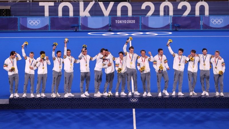 FILE PHOTO: Tokyo 2020 Olympics - Hockey - Men - Medal Ceremony - Oi Hockey Stadium, Tokyo, Japan - August 5, 2021. Players of Belgium celebrate on the podium after receiving their gold medals. REUTERS/Hamad I Mohammed