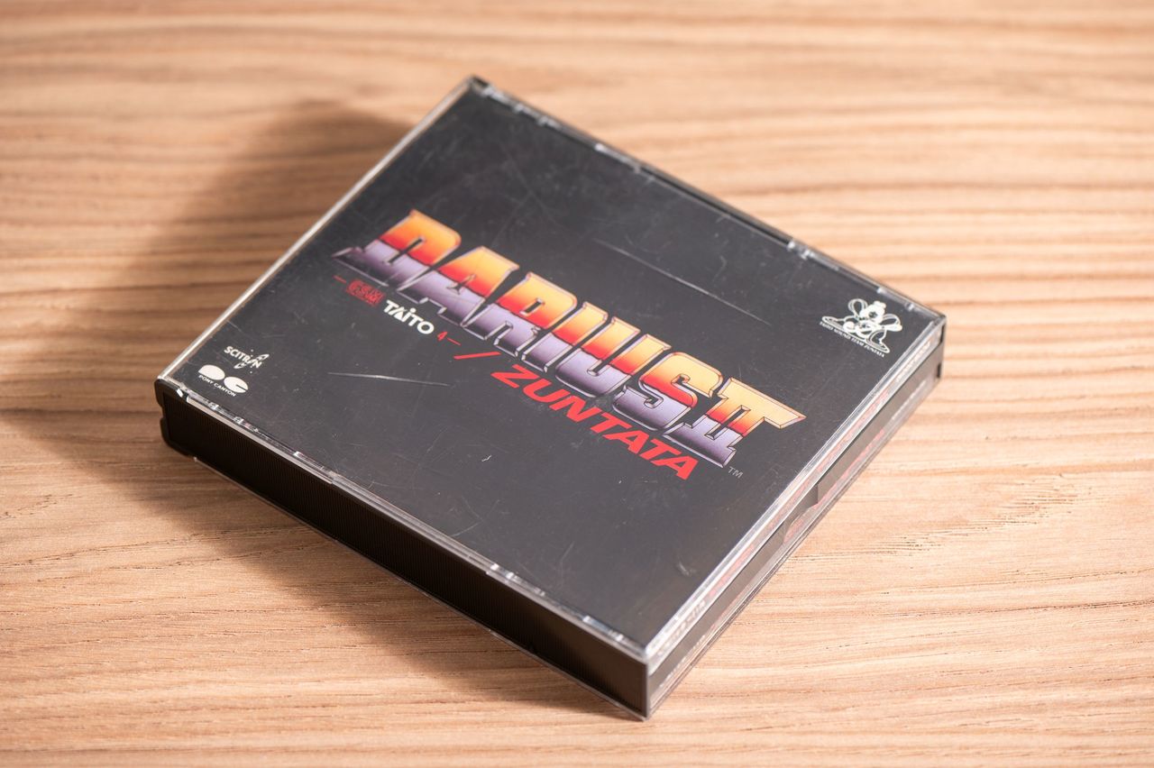 The soundtrack for Darius II, featuring the voice of Ogura’s daughter. (© Taitō Corporation, © Kodera Kei)