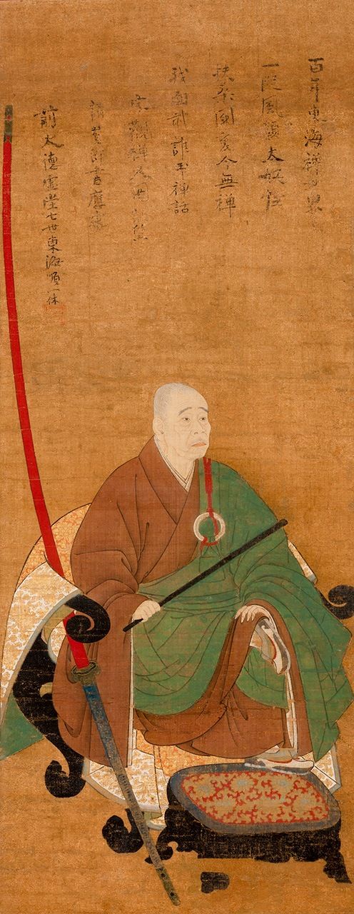 Retrato de Ikkyū Sōjun. A la izquierda, la espada roja con la que, según se cuenta, se paseaba por las calles de Sakai. (Colección del templo de Shū´on-an)