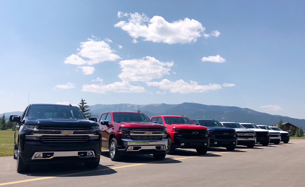 FILE PHOTO: Eight versions of General Motors CO’s new generation Chevrolet Silverado pickups are pictured lined up at an event near Alpine, Idaho, U.S. August 7, 2018.  REUTERS/Joseph White/File Photo