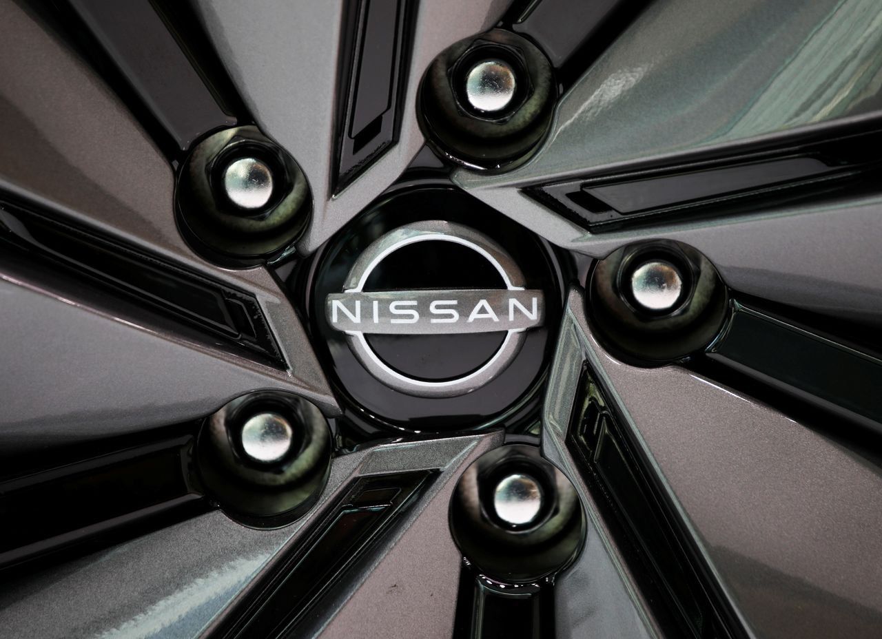 FILE PHOTO: The brand logo of Nissan Motor Corp. is seen on a tyre wheel of the company