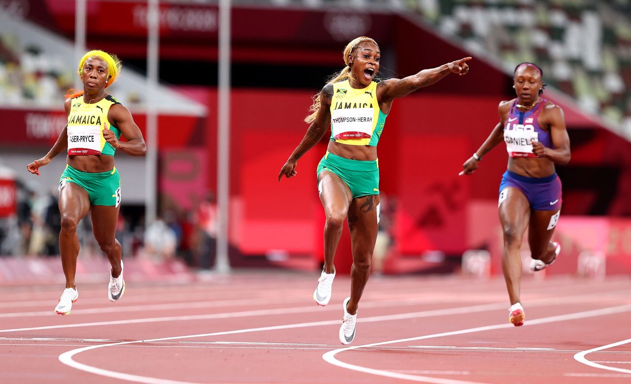 Jul 31, 2021. 
Foto del sábado de la jamaicana Elaine Thompson-Herah celebrando tras ganar la final de los 100 metros planos. 
REUTERS/Lucy Nicholson