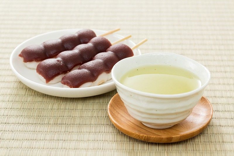 Dango skewers covered with a generous layer of koshian.