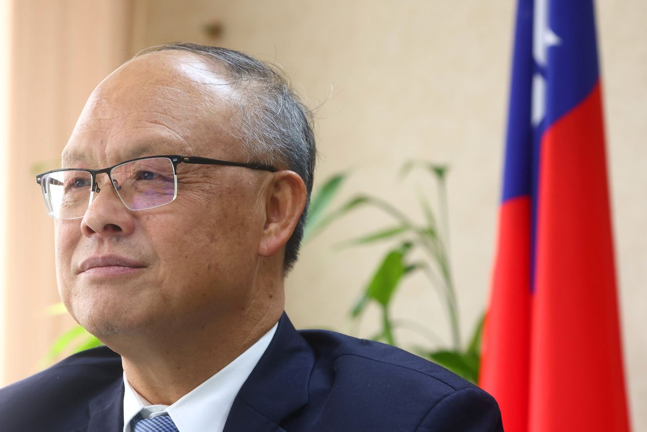 Le négociateur commercial en chef de Taïwan, John Deng. La candidature d