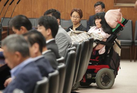 Kimura Eiko, victime de paralysie cérébrale
