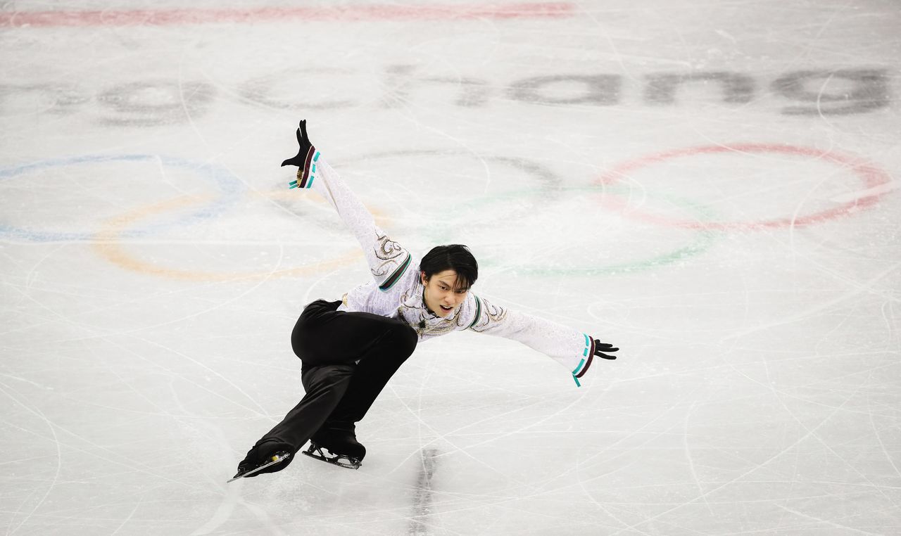 右足の負傷を抱えながら、圧巻の演技で連覇を決めた平昌五輪のフリー(時事)