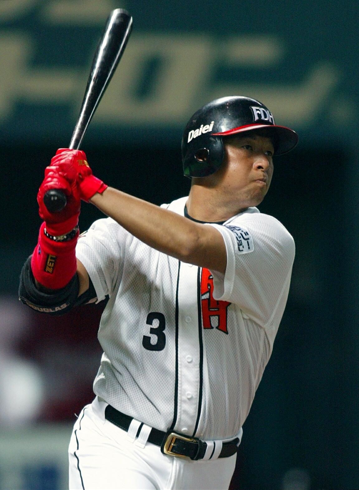 Nobuhiko Matsunaka hitting a home run (Jiji)