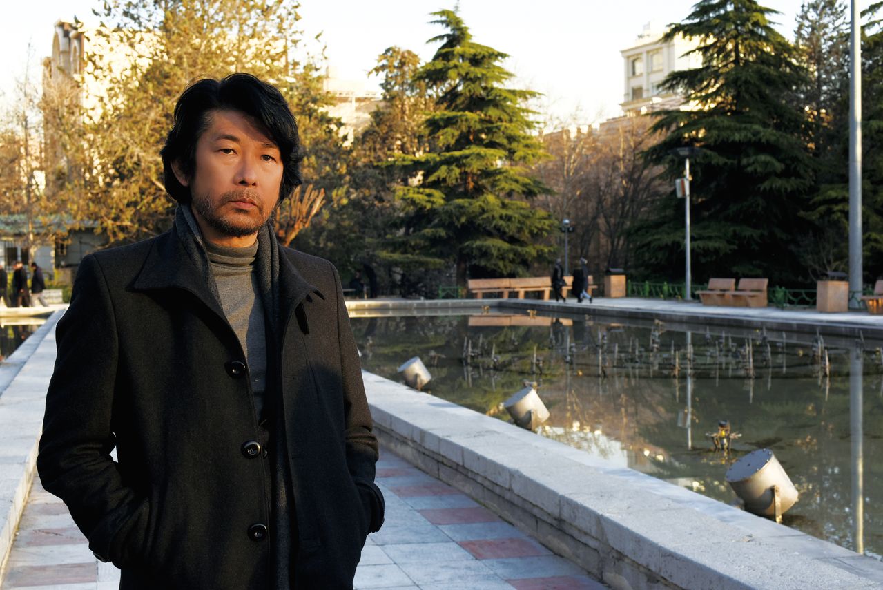 ヌシンの秘められた過去の扉を開く日本人・田中を永瀬正敏が好演 © Small Talk Inc.