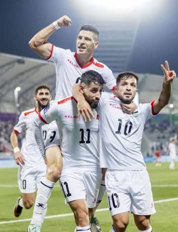 香港戦でゴールを喜ぶパレスチナの選手たち＝ドーハ（ゲッティ＝共同）