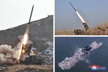 北朝鮮の国防科学院が実施した新型放射砲の発射実験＝11日（朝鮮中央通信＝共同）