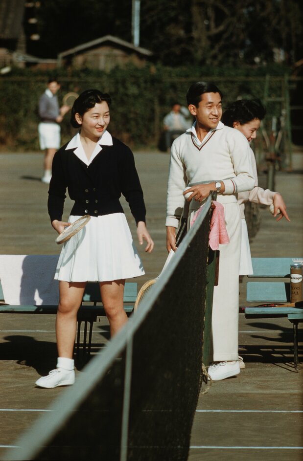 Newly engaged, Crown Prince Akihito and Shōda Michiko enjoy a game of tennis at the Tokyo Lawn Tennis Club on December 6, 1958. (© Jiji)