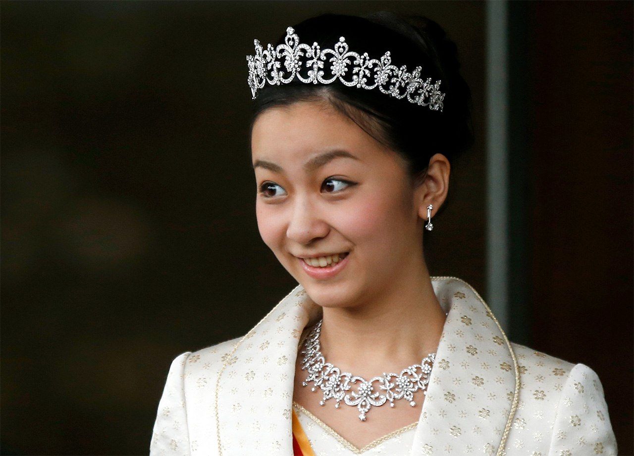 Како, вторая дочь семьи Акисино, во время церемонии совершеннолетия (Reuters)