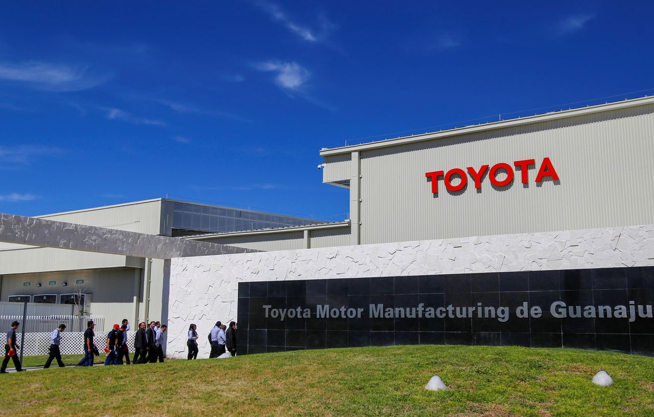 Employees walk at the Toyota Motor Corp new plant in Apaseo El Grande in Mexico