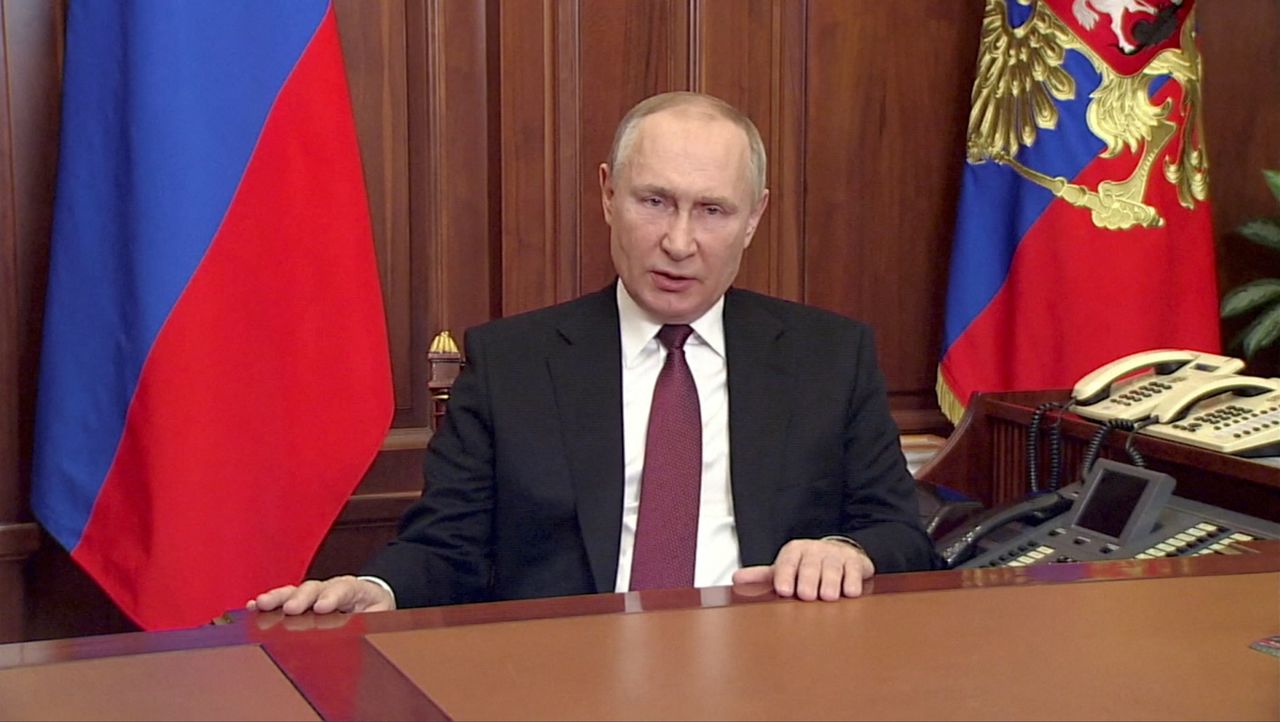 Russian President Vladimir Putin delivers a video address announcing the start of the military operation in eastern Ukraine, in Moscow, Russia, in a still image taken from video footage released February 24, 2022. Russian Pool/Reuters TV via REUTERS ATTENTION EDITORS - THIS IMAGE WAS PROVIDED BY A THIRD PARTY.