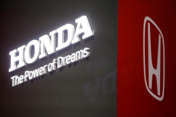 The Honda logo is displayed at the 89th Geneva International Motor Show in Geneva, Switzerland March 5, 2019. REUTERS/Pierre Albouy