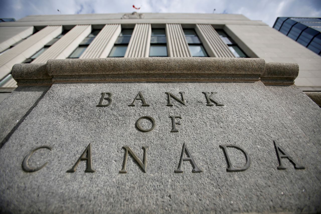 FILE PHOTO: A sign is pictured outside the Bank of Canada building in Ottawa, Ontario, Canada, May 23, 2017. REUTERS/Chris Wattie