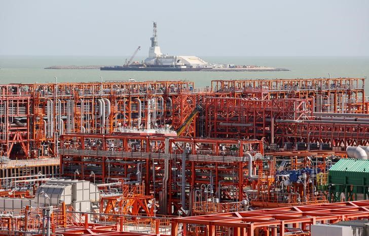 An oil rig (rear) and infrastructure of D Island, the main processing hub, are pictured at the Kashagan offshore oil field in the Caspian sea in western Kazakhstan August 21, 2013. To match Exclusive OIL-CASPIAN/ REUTERS/Stringer/File Photo