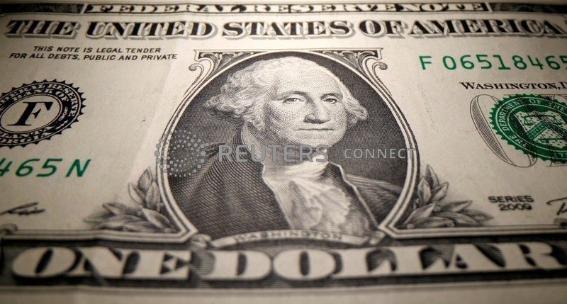 A U.S. Dollar banknote is seen in this illustration taken May 26, 2020. REUTERS/Dado Ruvic/Illustration/File Photo