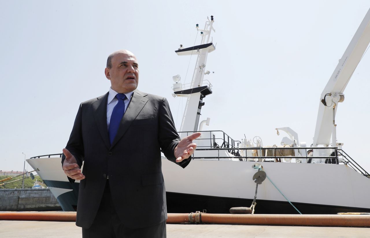 Russian Prime Minister Mikhail Mishustin visits the Yasny fish processing complex on the southern Kuril island of Iturup, Russia July 26, 2021. Sputnik/Dmitry Astakhov/Pool via REUTERS ATTENTION EDITORS - THIS IMAGE WAS PROVIDED BY A THIRD PARTY.